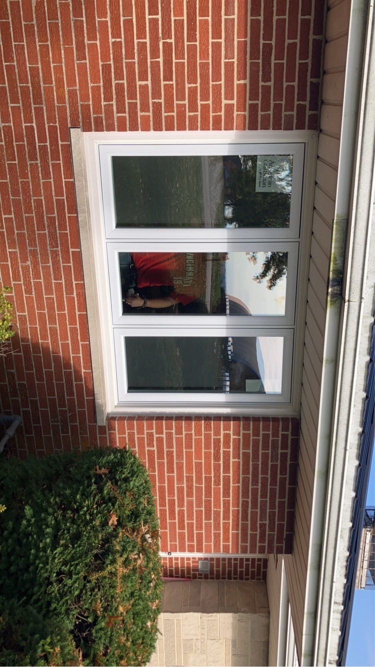 Finished white three-panel replacement window